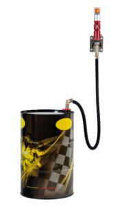 A drum dispenser pump mounted on a glossy black drum with yellow accents and the text "___ a good advice!" The pump has a red handle, against a white background.