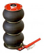 A stack of three black airbags connected by red plates, with a manual pump positioned on the right side, isolated on a white background.