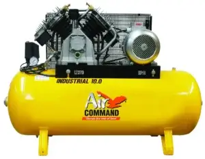 A yellow horizontal air compressor with a black motor and components mounted on top, labeled "INDUSTRIAL 40.0 AIR COMMAND." No visible action or context.