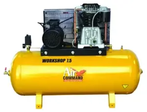 A stationary yellow air compressor with a black motor on top, labeled "WORKSHOP 7.5 AIR COMMAND, Stands the test of time." It's isolated against a white background.